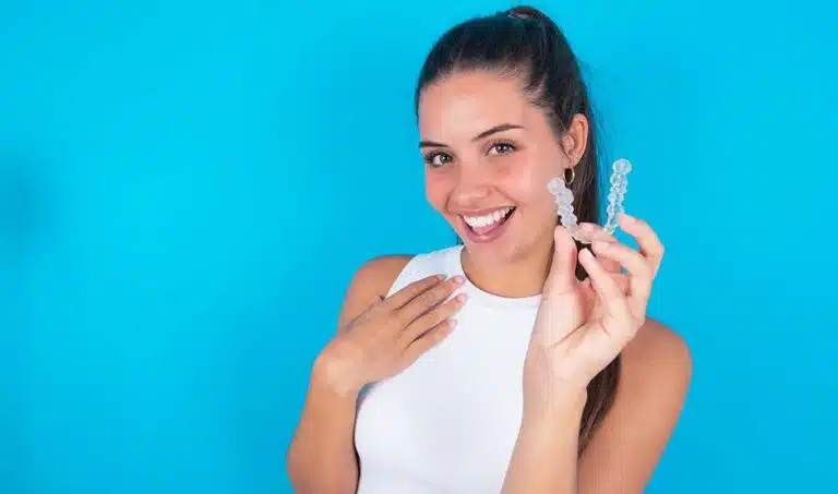 happy woman with Invisalign