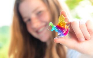 Picture of a girl holding retainer