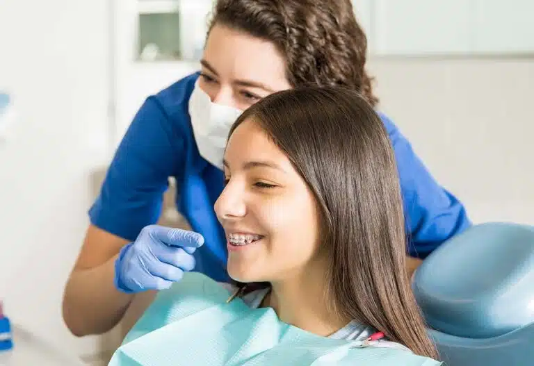 young girl with Invisalign
