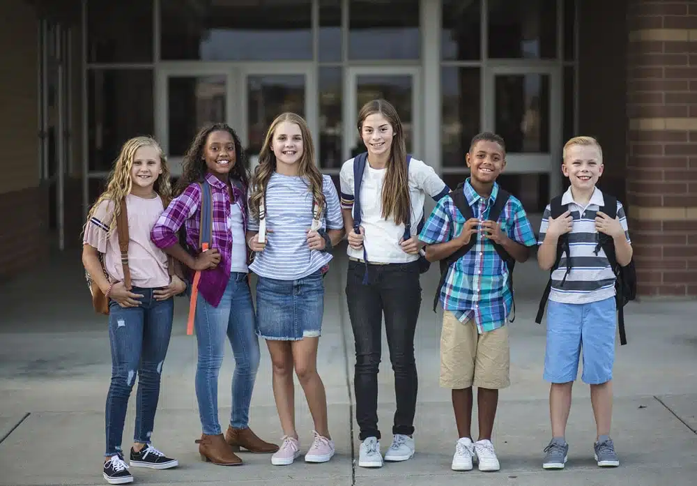 why-giving-back Happy Girl with Braces