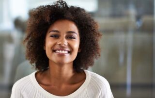 Happy Woman with Invisalign