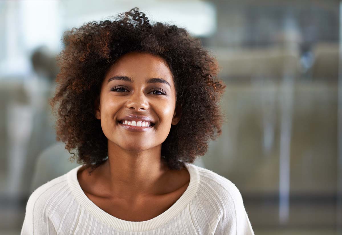 Happy Woman with Invisalign