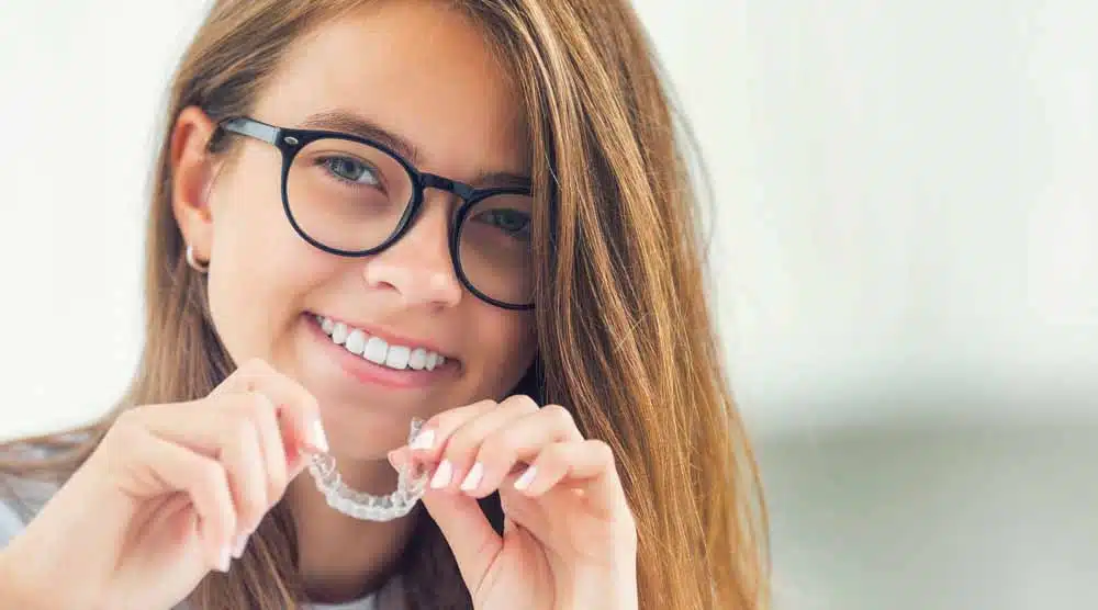 invisalign-cost-2 Woman with Braces