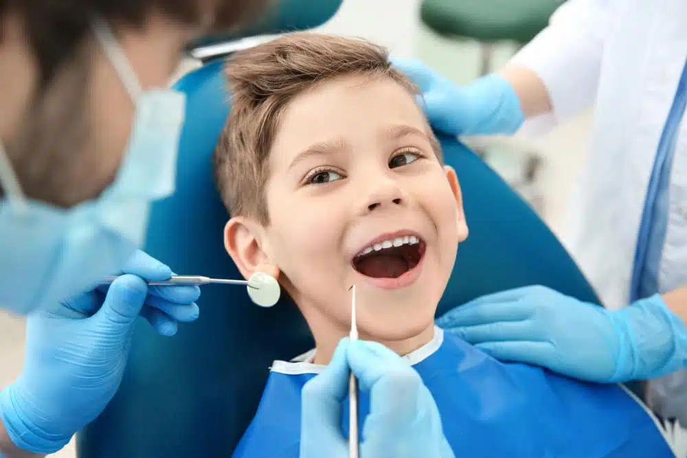 month-examination Happy boy with Braces