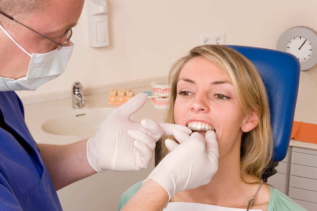 woman getting invisalign